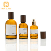 Botol Parfum Kaca Amber Bulat Kosong 30ml 50ml 100ml Mewah Custom dengan Tutup Kayu dan Label Custom