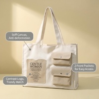 BunnyTote Tas Tote Kanvas Pola Huruf Sedang yang Tahan Lama dengan Kantong Multi Snap Kontras dan Label Cetak untuk Penggunaan Iklan, Cocok untuk Buku A4.