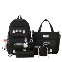Sac à dos scolaire tendance en toile de grande capacité, nouveau style, léger, ensemble multi-pièces, coussin d'air, unisexe, sac à livres pour étudiants