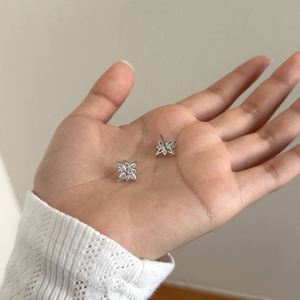 Dylam <b>Fine</b> Stylish Rhodium Plated 925 Sterling Silver Non Tarnish 5A Zirconia Snowflake Shape <b>Stud</b> <b>Earrings</b> for Women - Product Image 3