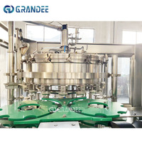 Machine de remplissage de canettes de soda entièrement automatique Ligne de canettes en aluminium pour jus carbonaté