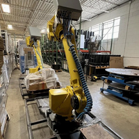 Robot industriel Fanuc M-710IC/50 à 6 axes avec pince robotique CNGBS pour la manutention et le chargement