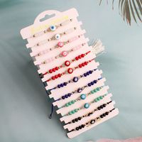 Bracelet ajustable fait main Resoul avec main de Hamsa et œil porte-bonheur, en perles et cordon rouge, amulette porte-bonheur, bijou d'amitié pour femme