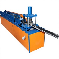 Machine de formage de rouleaux pour portes à enroulement de type lamelles métalliques, équipement de fabrication de portes à enroulement, production industrielle
