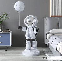 Statues de bureau en résine de plateau de combinaison spatiale d'astronaute