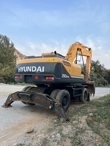 Prix usine Machine pelleteuse Corée Original HYUNDAI 210w-9 pelles sur pneus d'occasion 21ton bonne condition - Product Image 2