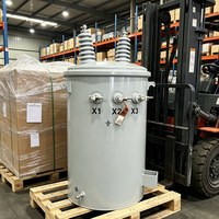 Transformateur de distribution monophasé 20 kVA monté sur poteau, transformateur de puissance immergé dans l'huile, bobinage en cuivre pour utilisation extérieure