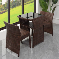 Ensemble bistro patio peu encombrant avec table en verre trempé chaise rembourrée en osier pour mobilier de jardin extérieur ou utilisation en entrepôt