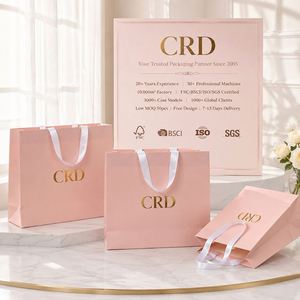 Sacs de courses en papier kraft biodégradables et écologiques avec logo personnalisé, gaufrage en gros pour l'emballage de vêtements de détail des petites entreprises - Product Image 2