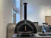 Four à pizza moderne de qualité supérieure, portable, pour l'extérieur, en acier inoxydable, noir titane, à charbon de bois/bois, double usage, allumage piézoélectrique