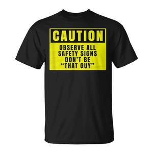 Camiseta con la frase "Caution Observe All Safety Signs Don't Be That Guy", color negro, para adultos, unisex - Product Image 1