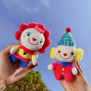 Nuovo simpatico cartone animato creativo circo pagliaccio peluche portachiavi borsa ciondolo all'ingrosso artiglio macchina bambola farcito divertente pagliaccio peluche