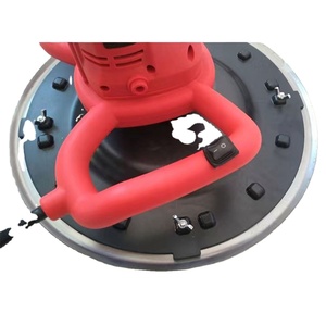 Máquina manual roja para enlucir paredes con componente de motor central - Product Image 1