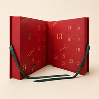 Boîte de calendrier de l'avent personnalisée 24 jours avec un design de style livre en papier rigide écologique, fermeture à ruban et portes numérotées