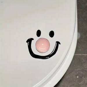 Lève-couvercle de toilettes écologique de style contemporain en ABS avec film UV, en forme de boule souriante, pour salle de bain - Product Image 4