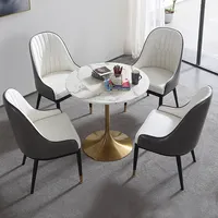 Mesa de comedor redonda de mármol ovalado, conjunto de sillas para cafés y restaurantes