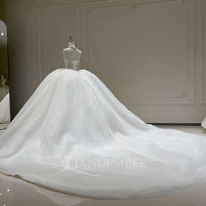Robe de mariée princesse en tulle scintillant ornée de cristaux, sans bretelles, couleur ivoire, avec longue traîne, modèle Jancember - Product Image 3