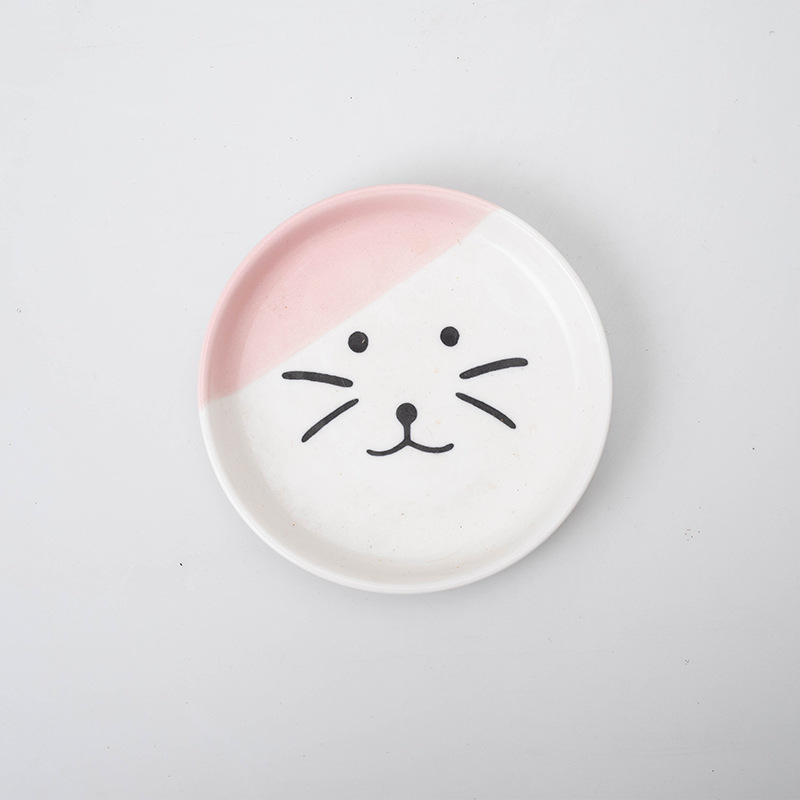 Plato individual con cara de gato rosa