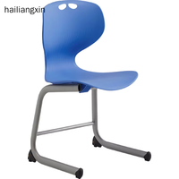 Chaise de réception, de conférence, de bureau ou de salle à manger en polypropylène empilable avec dossier perforé pour restaurant