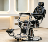 Fauteuils de barbier vintage haut de gamme en cuir noir capitonné, fauteuil de barbier professionnel inclinable hydraulique en chrome poli
