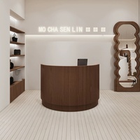 Bureau de réception incurvé cannelé de luxe et durable avec comptoir de réception LED demi-cercle, design personnalisable