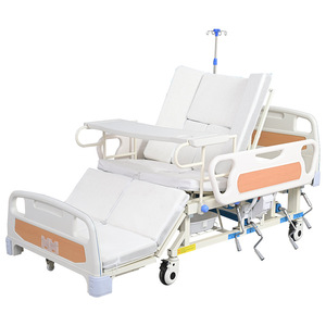 Cama de enfermería manual Huinuo con mecanismo de volteo y elevación de piernas para ancianos y pacientes - Product Image 1