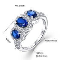 Élégante bague demi-éternité ovale en argent sterling 925 sertie de zircons et de saphirs bleus pour femme, idéale pour un mariage