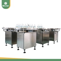 Désaggrégateur de bouteilles rotatif automatique certifié CE, machine d'alimentation par plateau tournant pour bocaux en plastique et en verre
