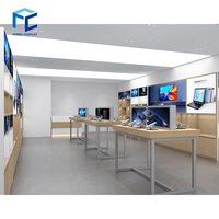 Mobilier pour atelier de réparation d'ordinateurs Moderne-computer-shop-interior-design Comptoir en bois Vitrine murale pour décoration de magasin de téléphonie