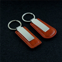 Porte-clés de voiture personnalisé en métal et cuir PU avec logo gravé au laser pour les cadeaux des concessionnaires automobiles