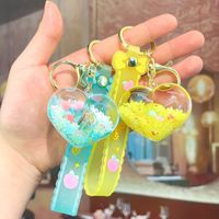 Porte-clés décoratif en acrylique, motif dessin animé mignon, avec perles bulles colorées et bouteille à sable mouvant à l'huile