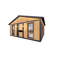 Maison préfabriquée en conteneur à grain de bois clair, villa légère en acier isolée, cabane portable détachable pour le glamping, les centres de villégiature et les séjours à la maison.