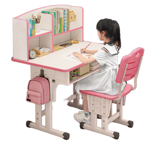 ピンクの子供用学習椅子とテーブル、メッシュ生地のバタフライバックレストとクランク式高さ調整機能付き、宿題の勉強部屋用 - Product Image 1