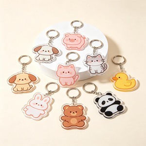 Porte-clés personnalisés en acrylique en forme de patte de chien de dessin animé pour la vente en gros aux animaleries - Product Image 1