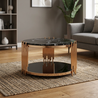 Table basse ronde de style indien et italien avec plateau en marbre et structure en métal finition cuivre, mobilier contemporain pour salon