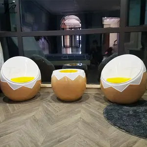 Restoran fiberglass ruang makan kursi berlengan telur dan set meja kuning kopi