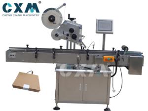 Etiquetadora plana automática de esquinas de cartón para entrega urgente Negocio individual - Product Image 2