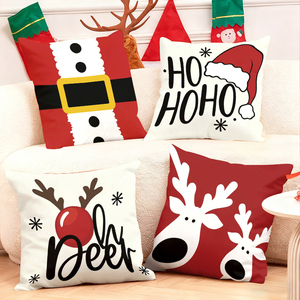 Christmas throw pillows featuring Santa reindeer and festive designs for holiday decor - Product Image 1