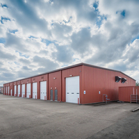 Entrepôt préfabriqué certifié CE avec structure en acier légère de style design moderne, petite porte, garantie de 5 ans