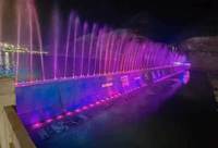 Barrage d'air innovant intégré à une fontaine musicale et à un éclairage LED |   Porte d'eau personnalisée