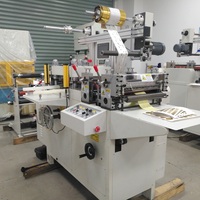 Machine de découpe automatique pour ruban VHB découpé et déchets de découpe réenroulés