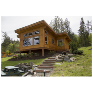 Chalet contemporain en bois sur terrain en pente avec fondation surélevée et larges fenêtres, un havre de paix sur le sommet d'une colline pour la vie en plein air - Product Image 1