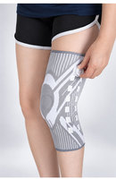 Genouillère de protection professionnelle à réglage ajustable avec stabilisateurs à ressorts, coussinet en silicone, tricot respirant, compression en polyester et fermeture à crochets