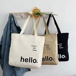 パーソナライズされたロゴキャンバスファブリックトートバッグビジネス印刷用カスタムロゴショッピングバッグ再利用可能な環境に優しい女性のトートバッグ