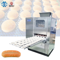 Machine automatique à grande capacité en acier inoxydable pour la division et le façonnage de pâtes sans huile, pour des boules de pâte de poids précis.
