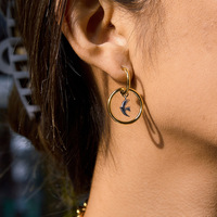 Boucles d'oreilles créoles en acier inoxydable 18K Wanxing Europe États-Unis, couleur assortie, colombe de la paix, creuses, tendance transfrontalière