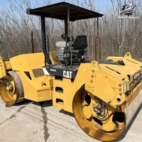 Compacteur à rouleaux vibrants à double tambour Caterpillar CB564D d'occasion en stock pour la construction de chaussées en asphalte