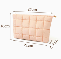 Sac de maquillage matelassé uni en gros, pochette moelleuse, trousse de toilette douce et rembourrée, sacs cosmétiques matelassés à fermeture éclair pour femmes