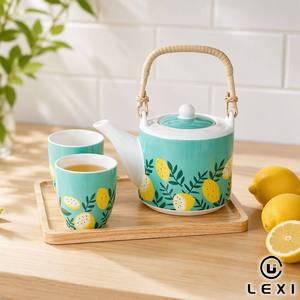 Service à <span class=keywords><strong>thé</strong></span> en porcelaine avec poignée en rotin, capacité 500 ml, théière, deux tasses, imprimé feuille de citron jaune, corps menthe, plateau de service en bois - Product Image 2