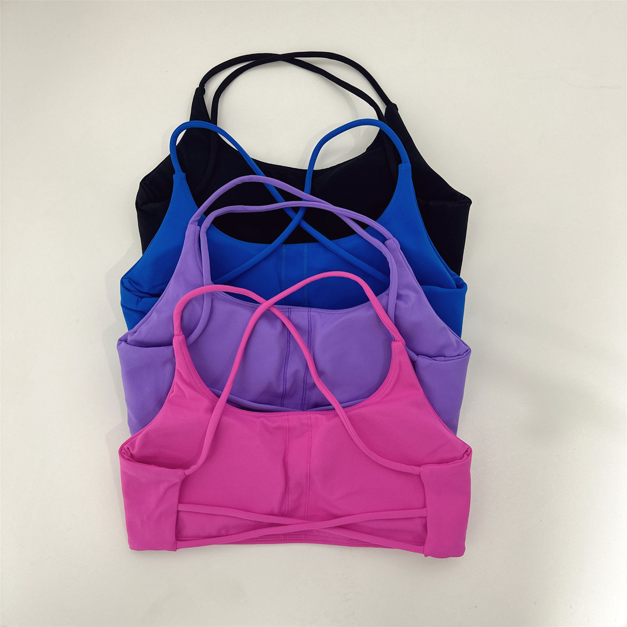 Custom Logo Cross Back Hollow Design Gym Yoga Top Shockproof With Chest Pad Quickly Dry Women Fitness Sports Bra